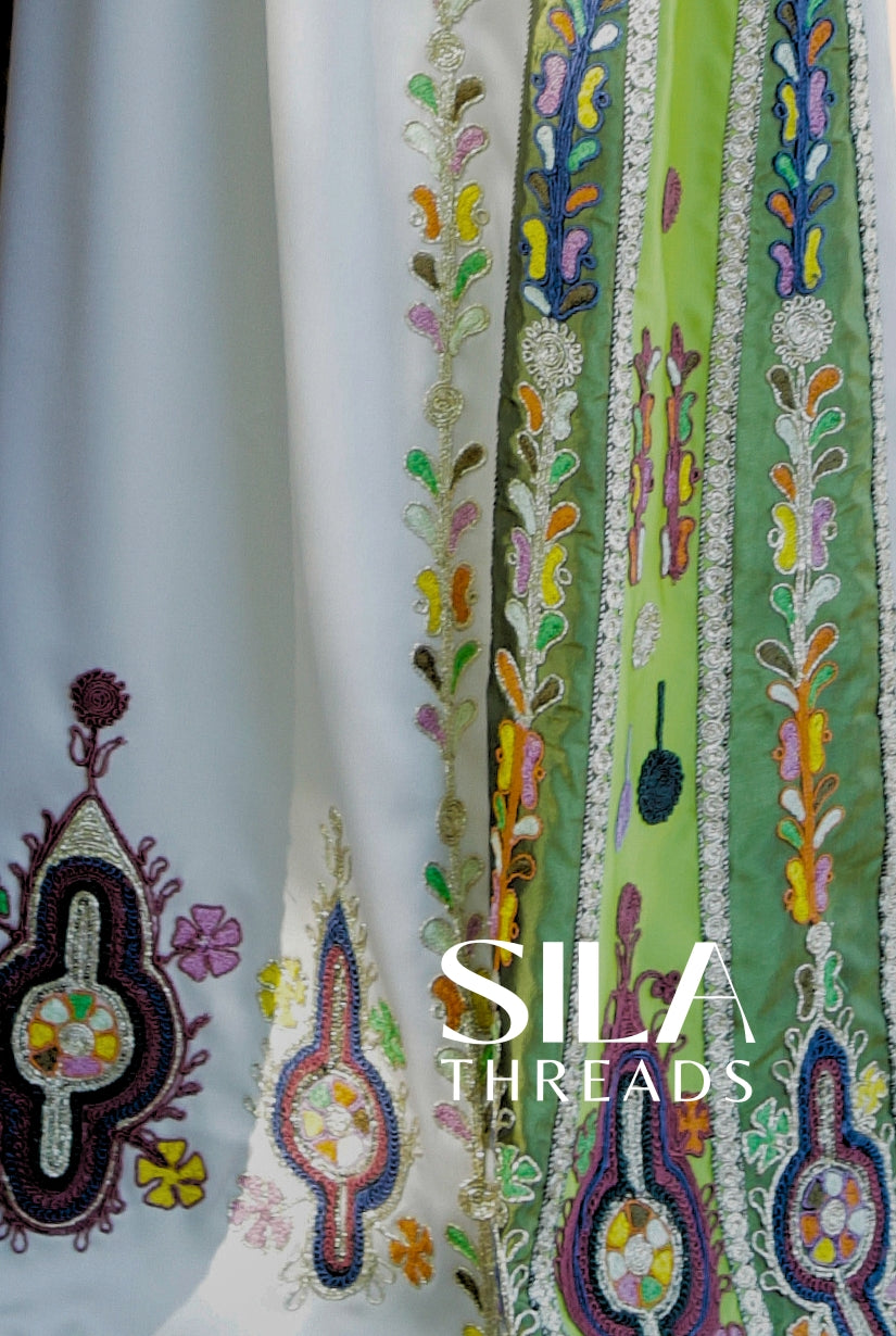 Zoom of Palestinian bridal thobe, with handmade embroidery. 