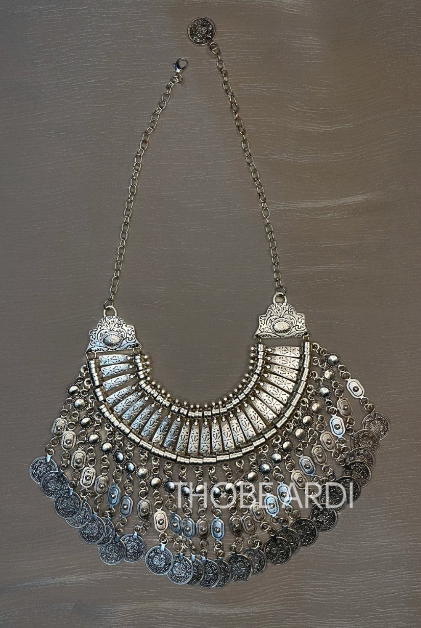 silver coin necklace, lightweight with arab influence and coins, full length photo