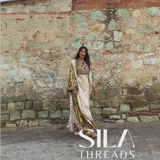 Video of palestinian thobe worn by women with a bridal palestinian veil. Customizable piece